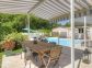 Chambre d'h&ocirc;tes - 21451 - Sarrola Carcopino - Le Grand Ajaccio - Labellis&eacute; G&icirc;tes de France : la terrasse c&ocirc;t&eacute; piscine